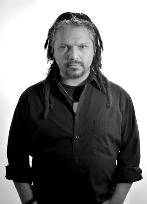 Retrato en blanco y negro de Chejo Enríquez